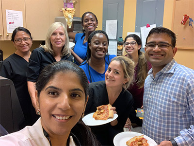 Integrity-interior-2 our team having a pizza party in a selfie