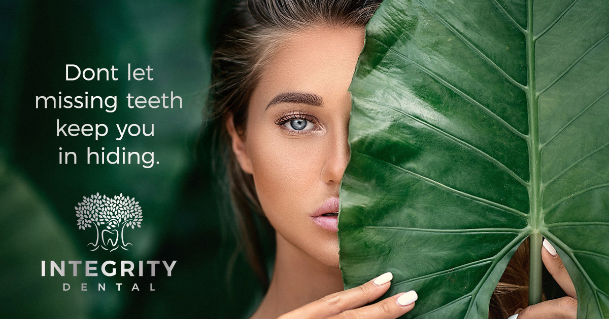 don't let missing teeth keep you in hiding