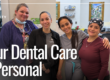 four woman coworkers smiling together